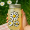 Impresión UV DTF por FL Fábrica de Ropa. Stickers aplicados en un vaso canche.